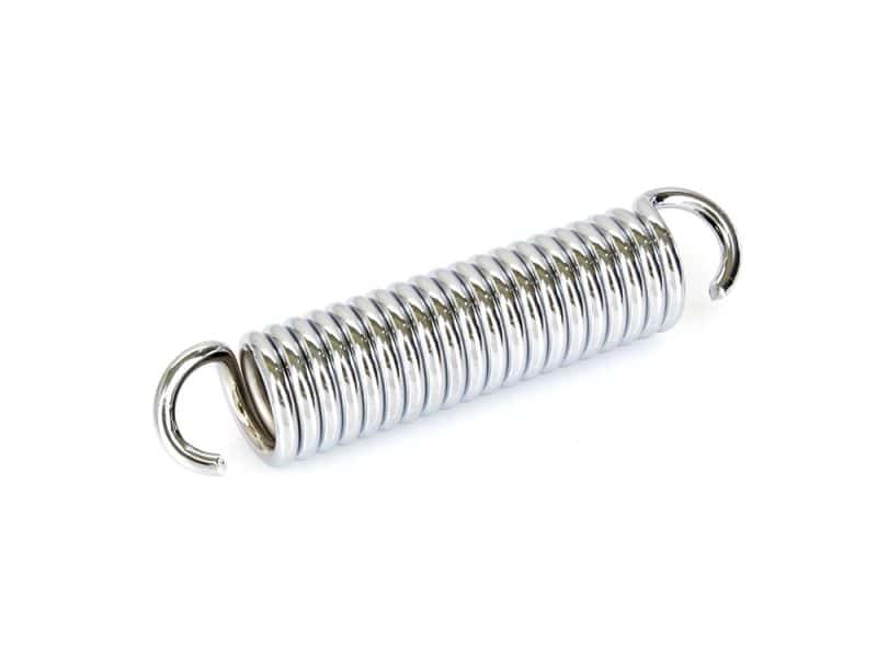 Shiny metal motorcycle suspension spring for Revelry Motorcycles.
