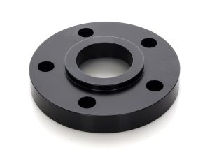 Black motorcycle wheel spacer for custom bikes and repairs.