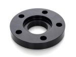 Black motorcycle wheel spacer for Revelry Motorcycles, durable, high-quality motorbike accessory.