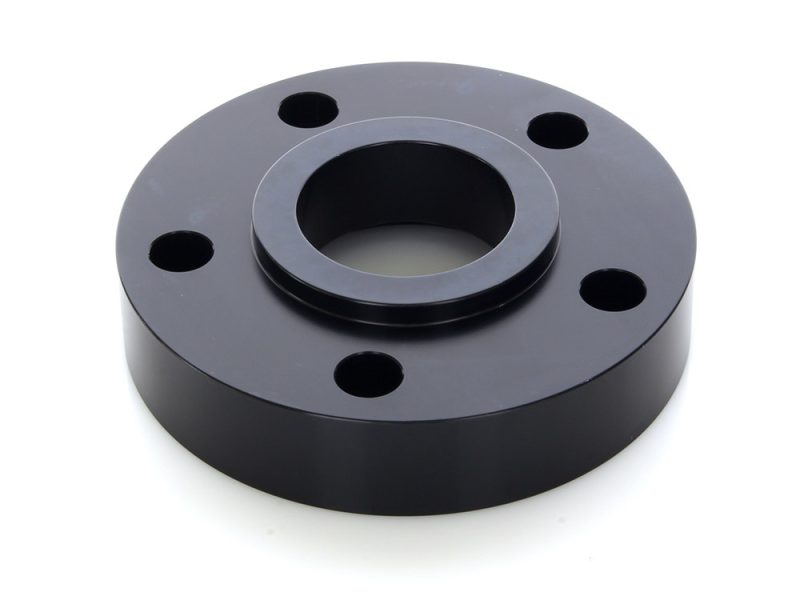 High-quality motorcycle hub, black anodised finish, specialised for custom bike builds.