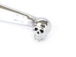 Polished chrome skull handlebar end cap for motorcycle enthusiasts.