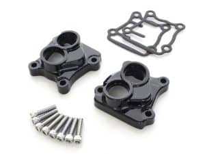 Black motorcycle dual throttle body mounts with gaskets and screws for Revelry Motorcycles.