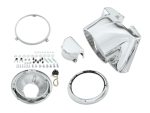Shiny chrome motorcycle headlight and headlamp mounting kit components.