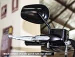 Black motorcycle handlebar and mirror from Revelry Motorcycles in Australia.