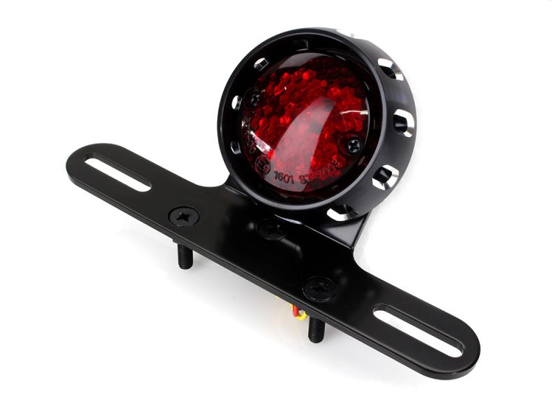 Bright red motorcycle tail light with black mounting bracket for Revelry Motorcycles.