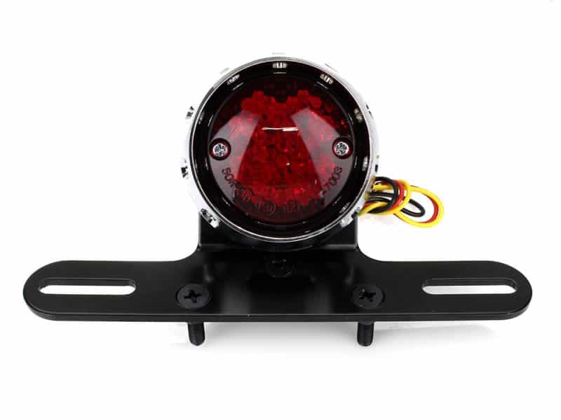 Retro Bobber LED Taillight - Chrome. Bright red motorcycle LED tail light for Revelry Motorcycles, ideal for custom bike lighting and safety.