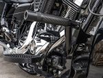 High-performance custom motorcycle engine with chrome and black accents from Revelry Motorcycles.