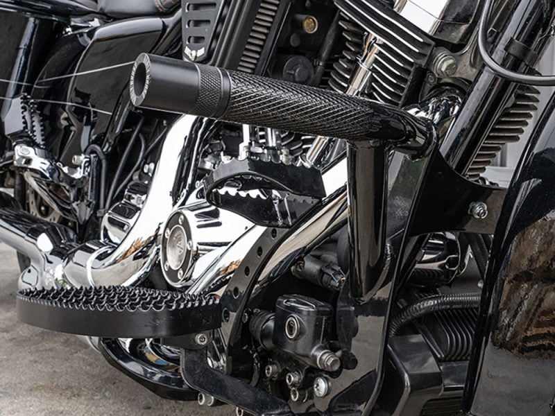 High-performance custom motorcycle engine with chrome and black accents from Revelry Motorcycles.