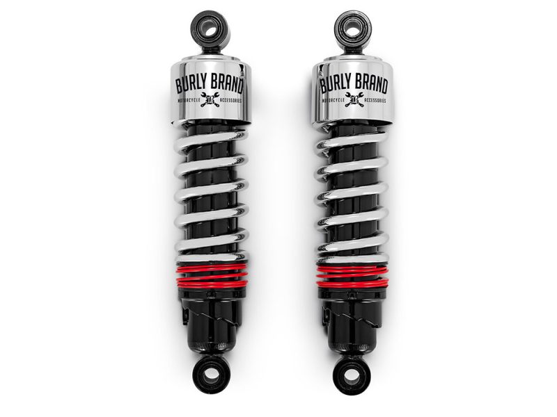 Heavy-duty motorcycle shocks with chrome finish for Harley Davidson bikes.