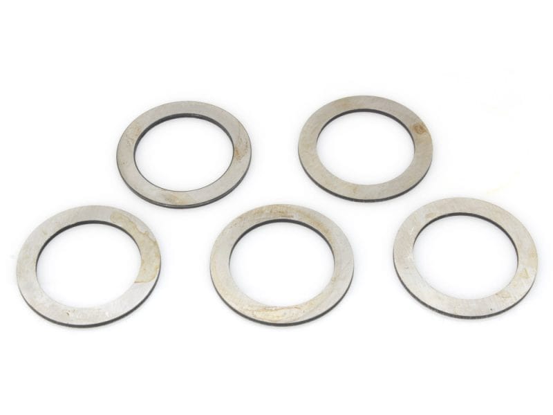 Stamped metal washers for motorcycle maintenance and repair.