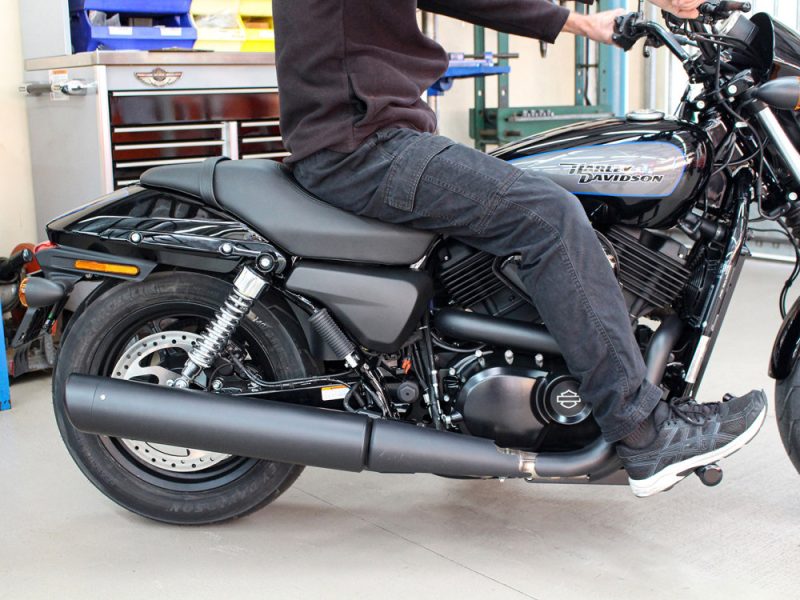 Harley Davidson motorcycle in a workshop or showroom setting.