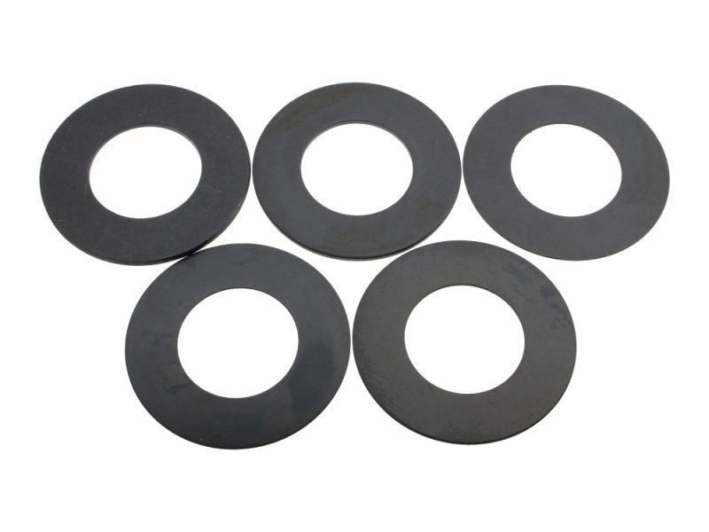 Set of black rubber washers for motorcycle maintenance and repairs.