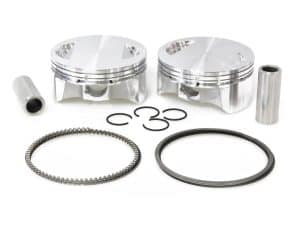 Aluminium motorcycle pistons with rings and clips for motorcycle engine repair.