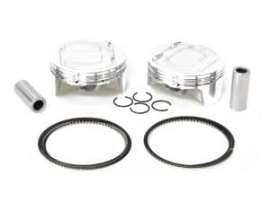 Aluminium motorcycle engine pistons with rings and pins for Revelry Motorcycles.