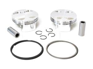High-performance motorcycle pistons with rings and fitting components for Revelry Motorcycles.
