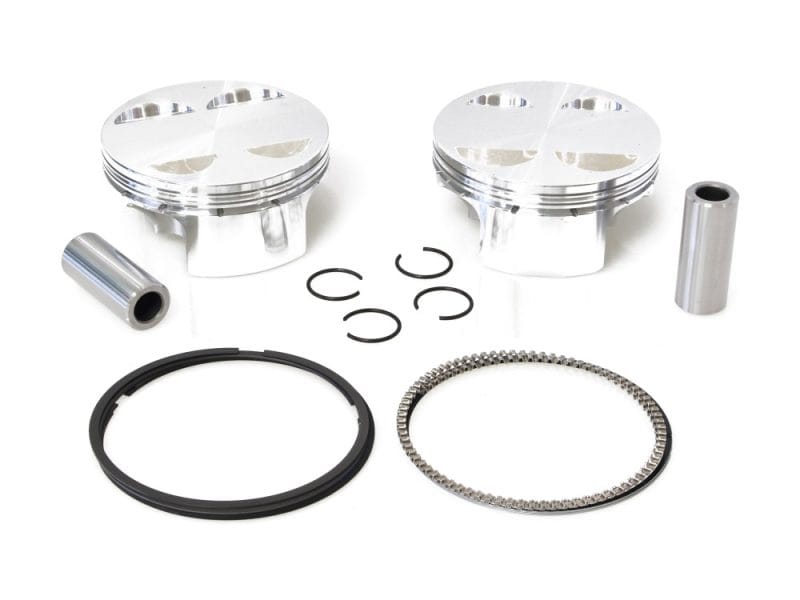 High-performance motorcycle pistons with rings and fitting components for Revelry Motorcycles.