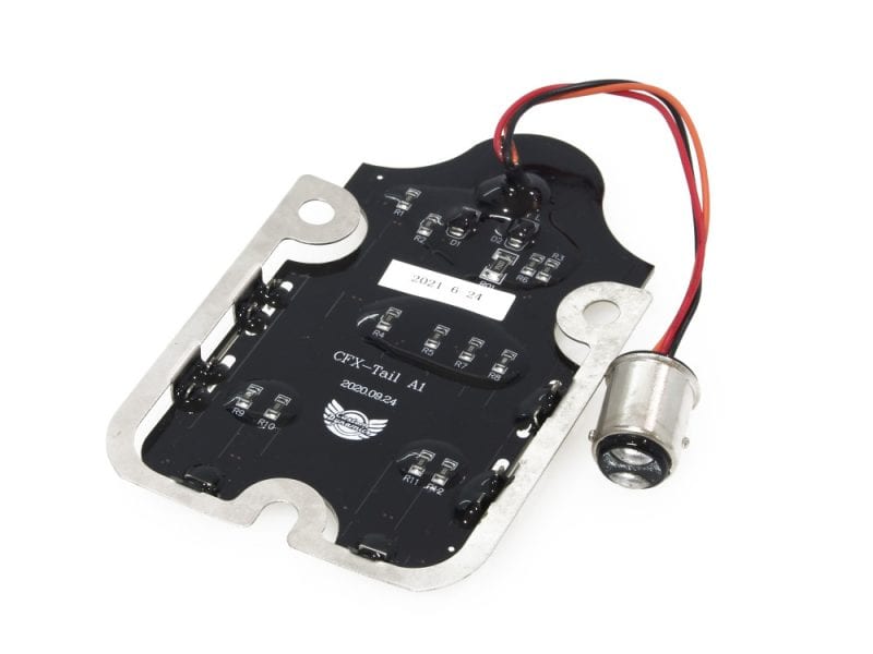 Compact motorcycle electronic component with wires and circuit board for Revelry Motorcycles.