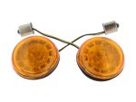 Vintage motorcycle indicator lights for Revelry Motorcycles, perfect for custom bike builds and restorations.