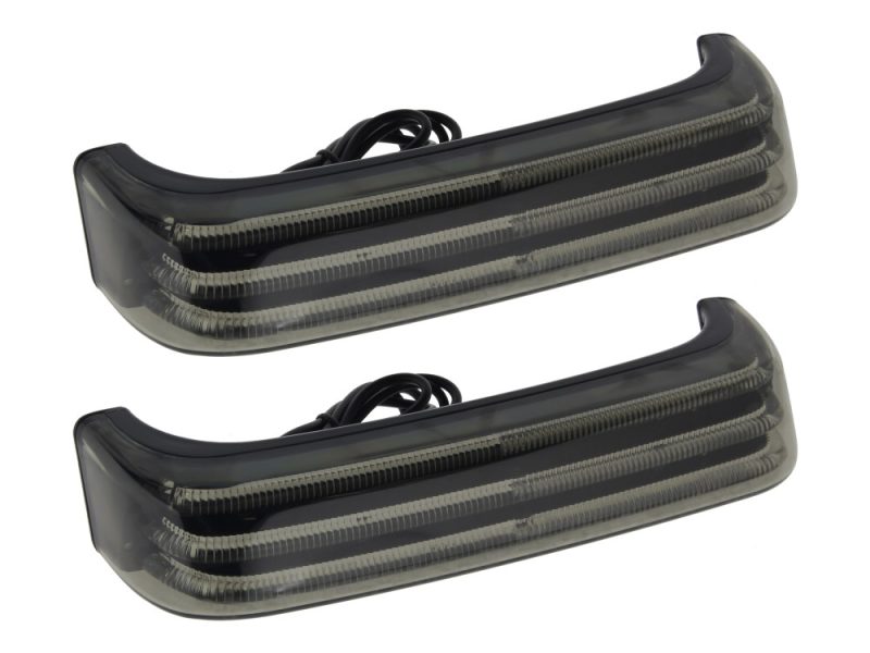 Highway motorcycle LED turn signals, black smoked lenses, stylish safety indicators for bikes.