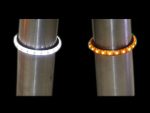 White and amber LED motorcycle turn signals on metallic bike fork, Revelry Motorcycles, Australian custom motorcycle accessories.