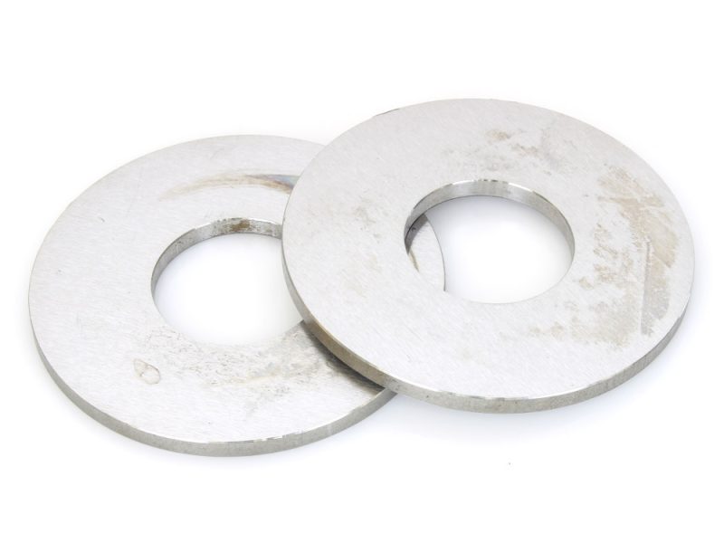 Aluminium washers for motorcycle engine components, durable and lightweight.