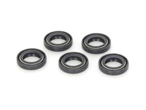 Sealed motorcycle wheel bearings in black with metal springs, for bike maintenance and repair.
