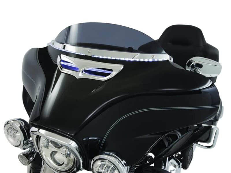 High-end motorcycle touring fairing with LED lights and aerodynamic design for Harley Davidson touring bikes.