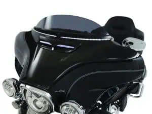 Sleek black motorcycle fairing with chrome accents and modern design elements.
