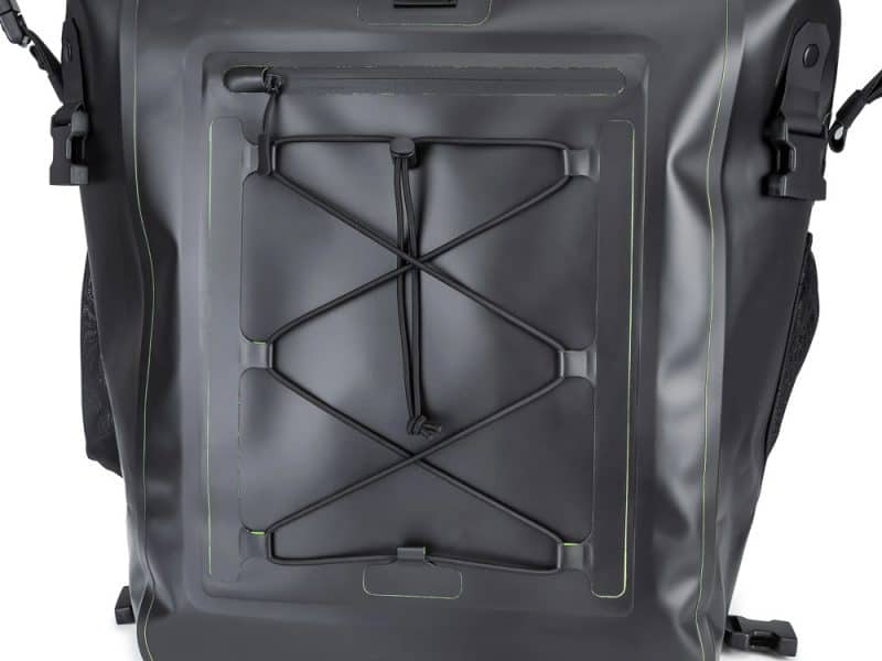Waterproof motorcycle pannier with bungee cord for secure gear storage.