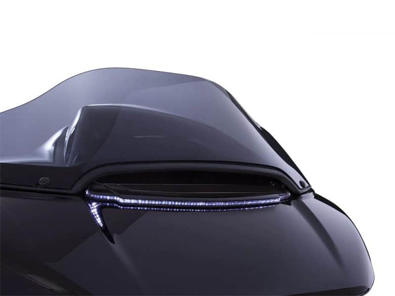 Futuristic black motorcycle with sleek aerodynamic design and LED lighting, ideal for motorcycle enthusiasts.