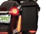 Bright LED tail lights on a black Revelry Motorcycle, showcasing advanced motorcycle lighting.