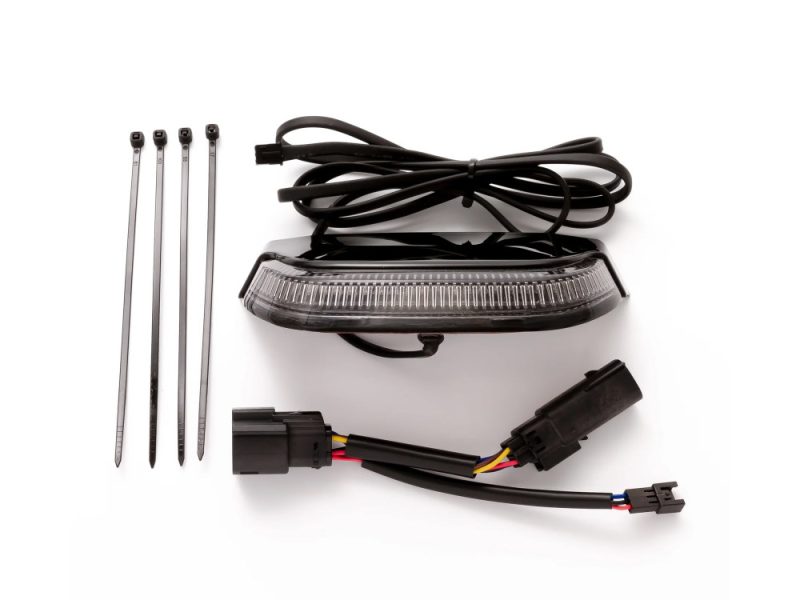 High-performance motorcycle LED indicator light with wiring harness and mounting hardware.