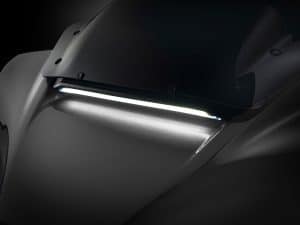 Industrial motorcycle headlight with sleek modern design for Revelry Motorcycles Australia.