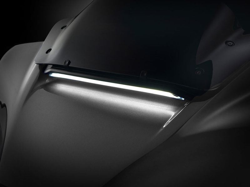 Industrial motorcycle headlight with sleek modern design for Revelry Motorcycles Australia.