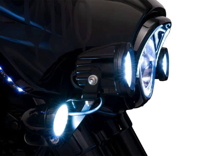 Bright LED motorcycle headlight with black casing and modern design.