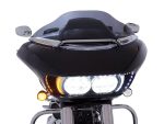 Black touring motorcycle with modern LED headlights and sleek design - Revelry Motorcycles.