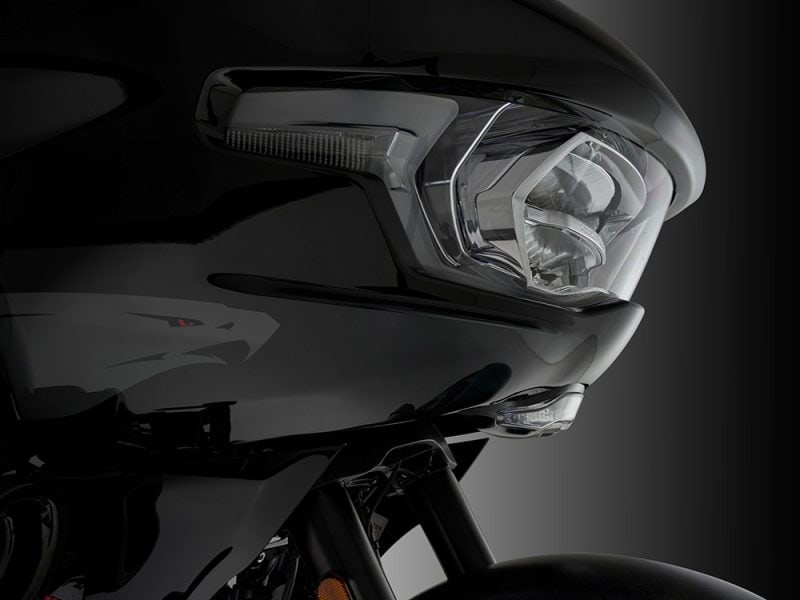 Refined black motorcycle helmet with advanced LED headlight, perfect for motorcycling enthusiasts in Australia.
