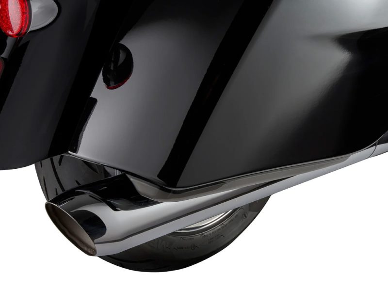 Chrome exhaust pipe on a black motorcycle, showcasing sleek design and high-quality craftsmanship.