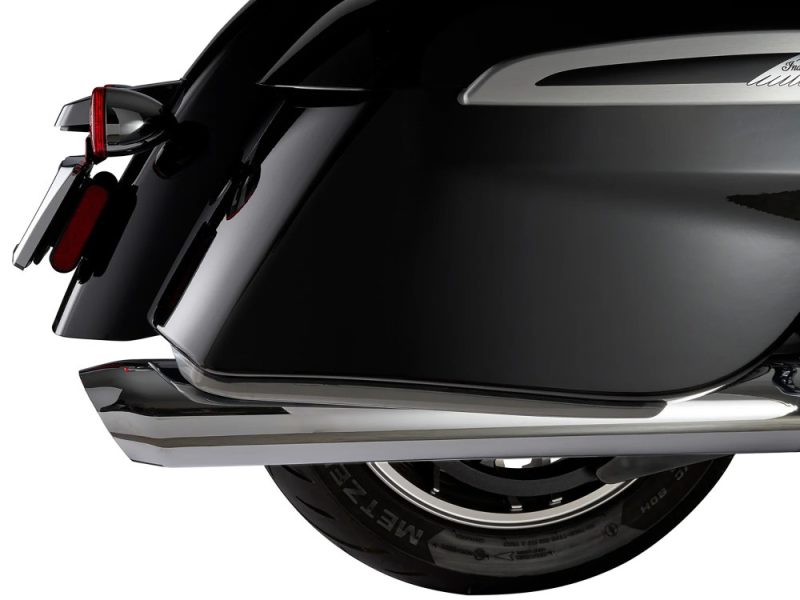 Sleek black motorcycle saddlebag and rear wheel close-up, featuring high-quality design and craftsmanship.
