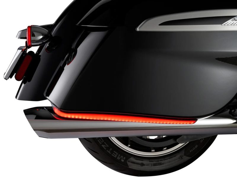 High-quality motorcycle side view with sleek black finish, showcasing Revelry Motorcycles' custom design.