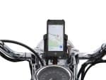 Motorcycle phone mount with navigation on a classic black cruiser bike.