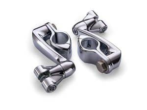 Sleek chrome motorcycle handlebar clamps for vintage and custom bikes.