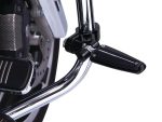 High-quality motorcycle footpeg on a retro-style bike for enhanced riding comfort.