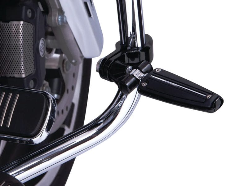 High-quality motorcycle footpeg on a retro-style bike for enhanced riding comfort.