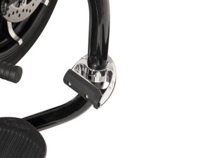 Chrome motorcycle footpeg mount on black frame, part of Revelry Motorcycles custom bike accessories.