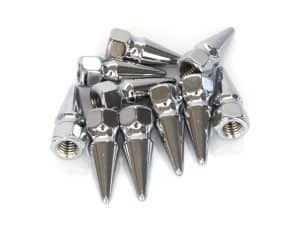 Chrome motorcycle wheel axles with nuts and cones.