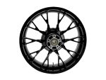 High-performance motorcycle wheel for Revelry Motorcycles, black alloy with intricate spoke design.