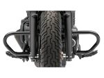 Suspension fork and front tire of Harley Davidson motorcycle, displaying rugged design for motorcycle enthusiasts.