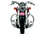 Vintage cruiser motorcycle with chrome accents and red paint for Australian motorcycle enthusiasts.