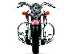 Vintage cruiser motorcycle with chrome accents and red paint for Australian motorcycle enthusiasts.